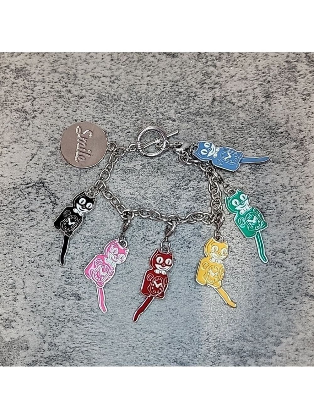 Kit-Cat Klock Charm bracelet clock